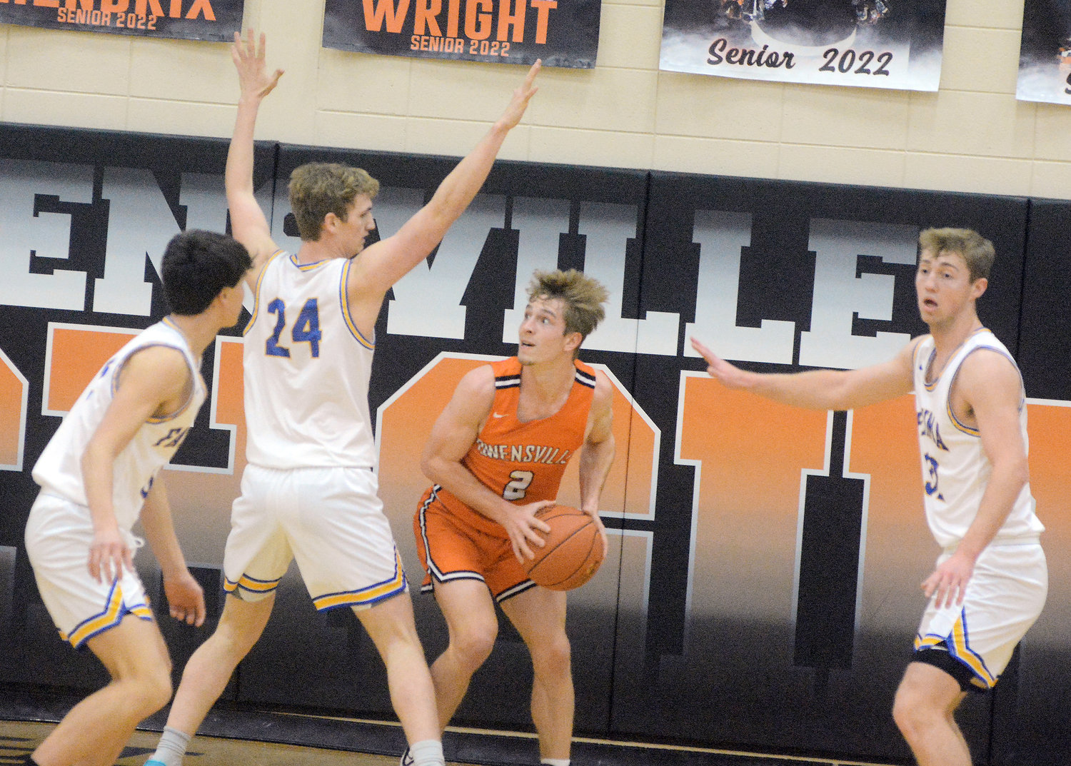 Brendan Decker (third from left) looks for somewhere to go while Fatima’s Nate Lehmen guard him during opening-round action Monday night in the 33rd Owensville Varsity Boys Basketball Tournament. Top-seeded Fatima sent the host Dutchmen to the consolation side of the bracket following an 82-38 defeat.